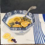 Blue bowl with oranges