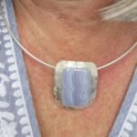 Crazy lace silver pendant