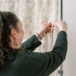 Focusing on the small details of a macrame curtain Focusing on the small details of a macrame curtain